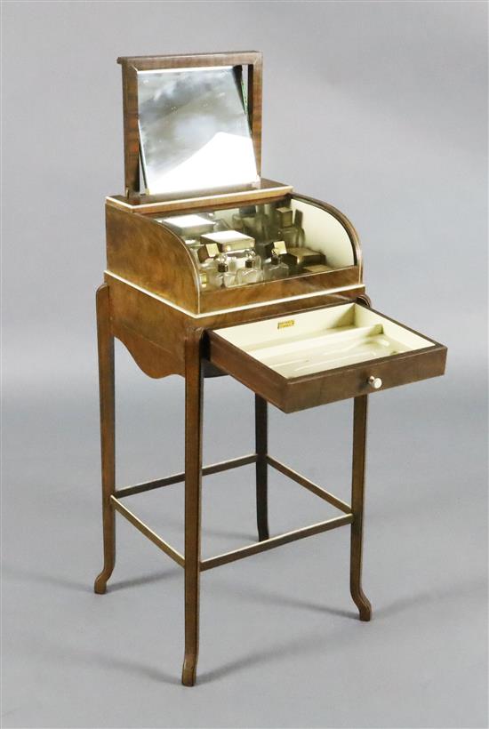An Art Deco walnut ladies dressing table by George Betjemann & Sons Ltd for Maple & Co Ltd, W 1ft 1.5in D 1ft 0.5in H 2ft 5in